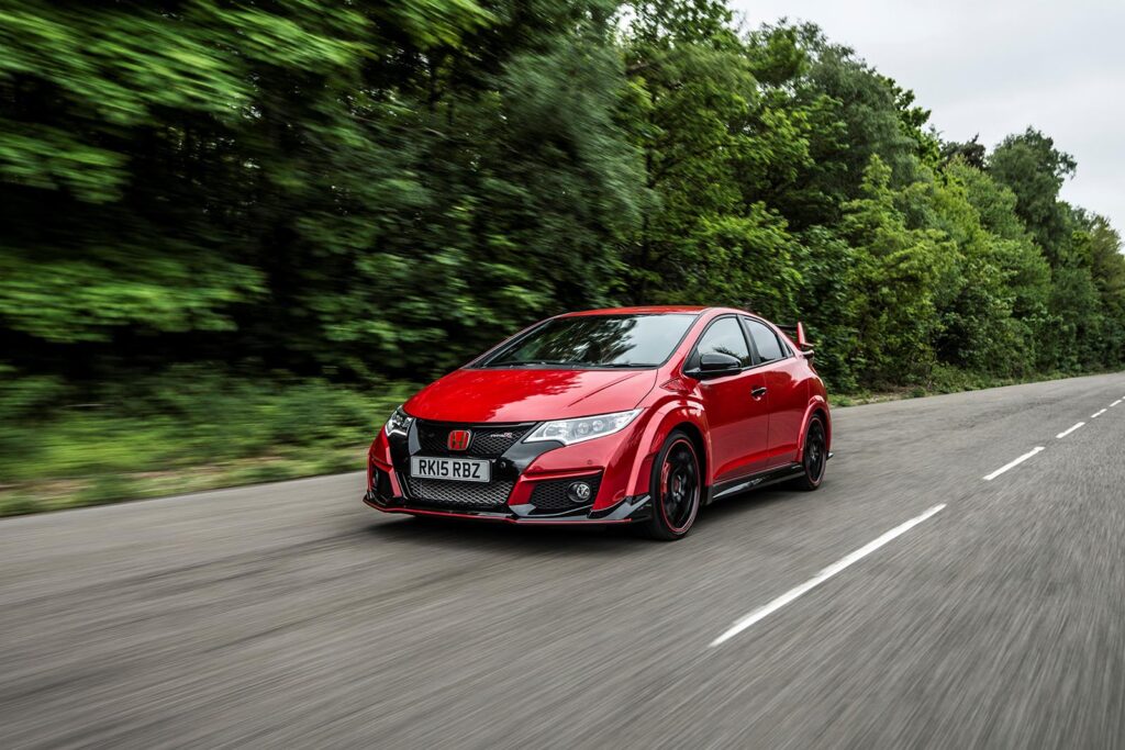 red honda civic on the road