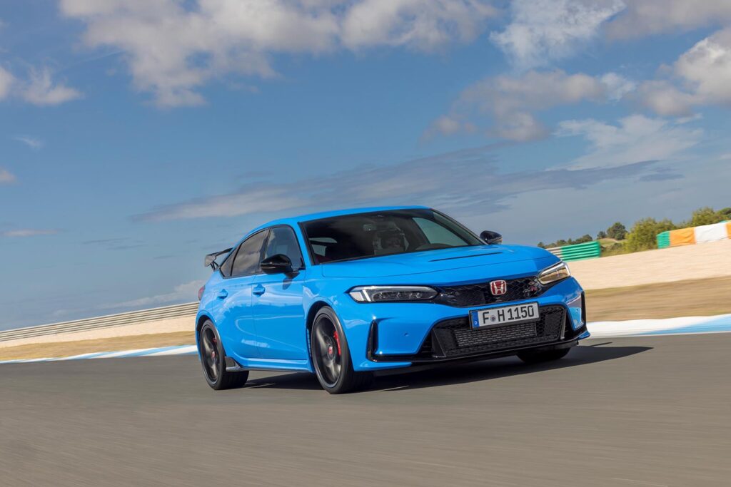 blue civic on racetrack