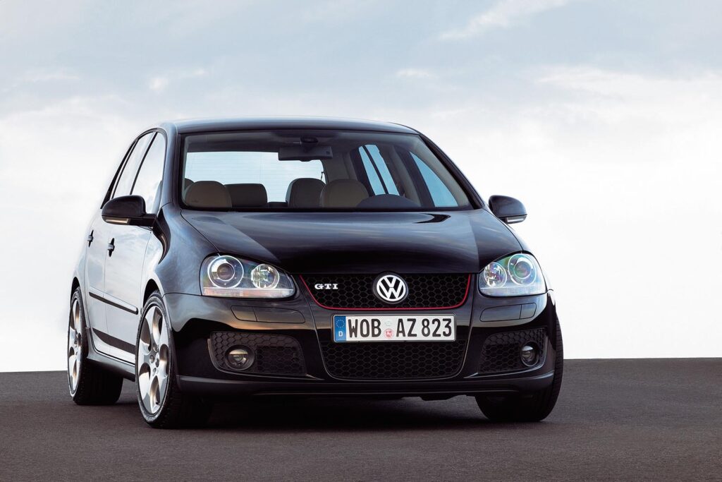 Black VW GTI with sky background