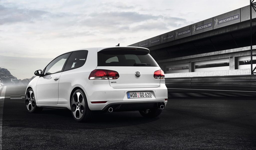 White VW GTI on racetrack