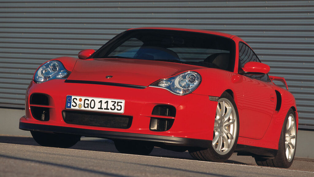 red Porsche car on road