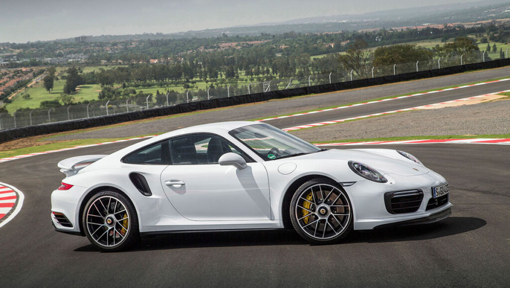 White 911 on racetrack