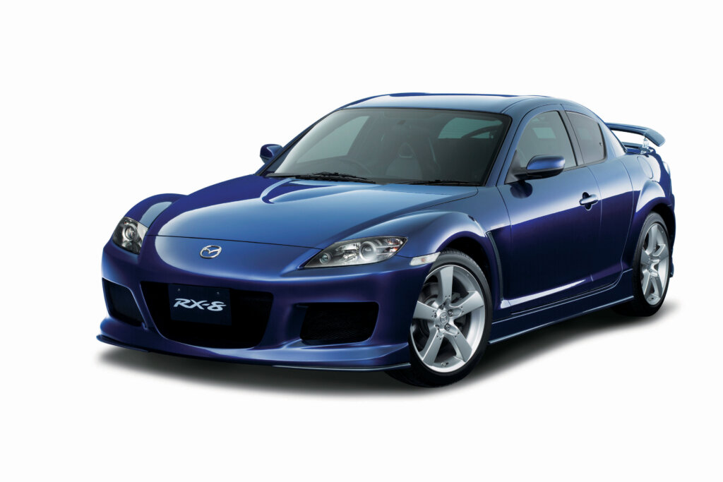 Blue Mazda RX8 on an all white background