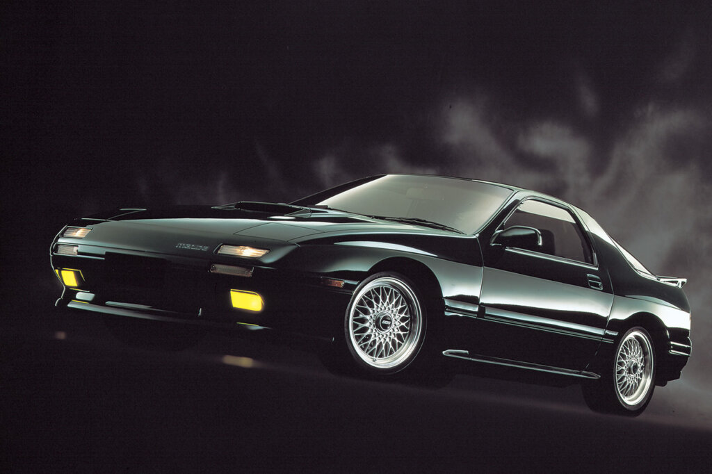 black Mazda Rx7 FC on black background