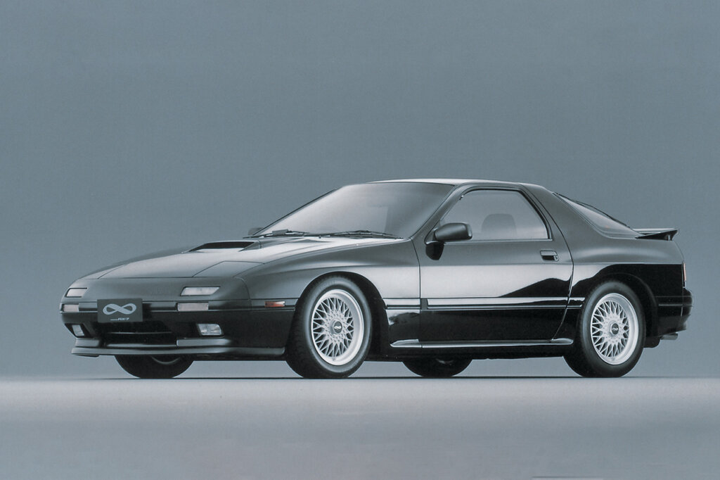 black Mazda rx7 FC on plain background