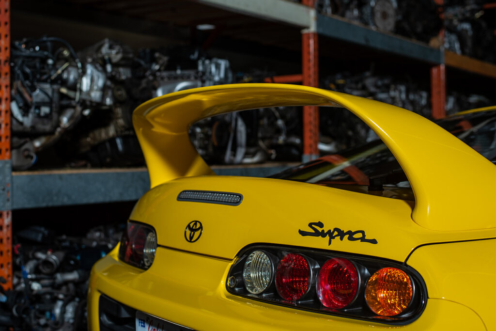 rear end of A80 supra in a garage