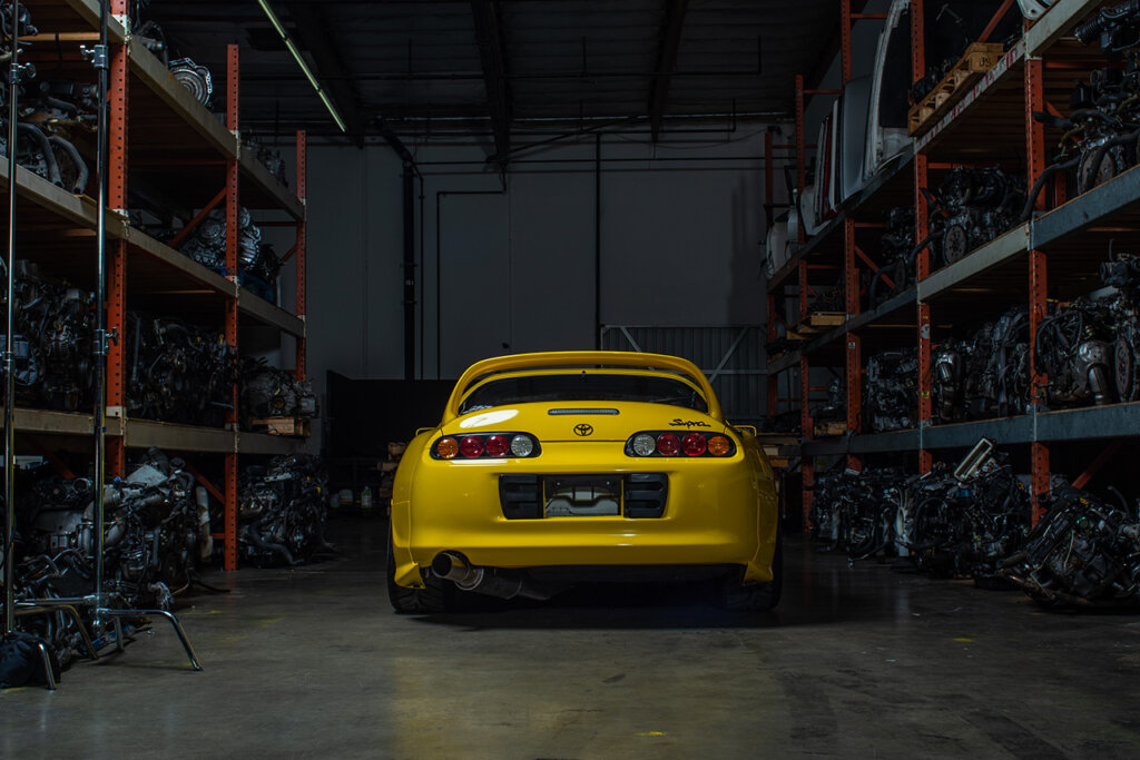 rear end shot of yellow A80