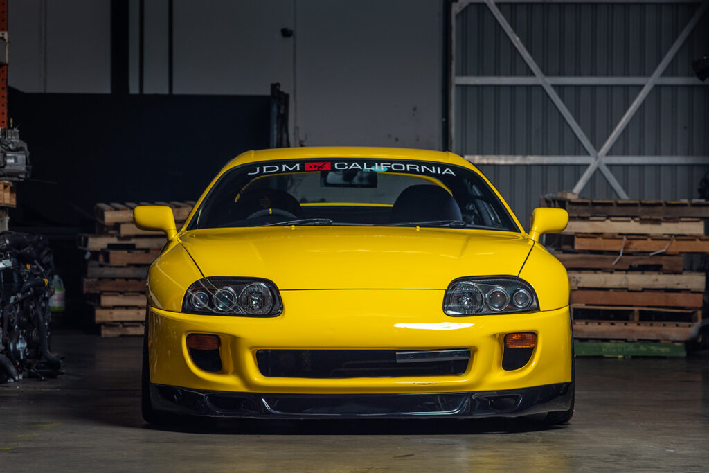 front end of yellow 4th gen supra