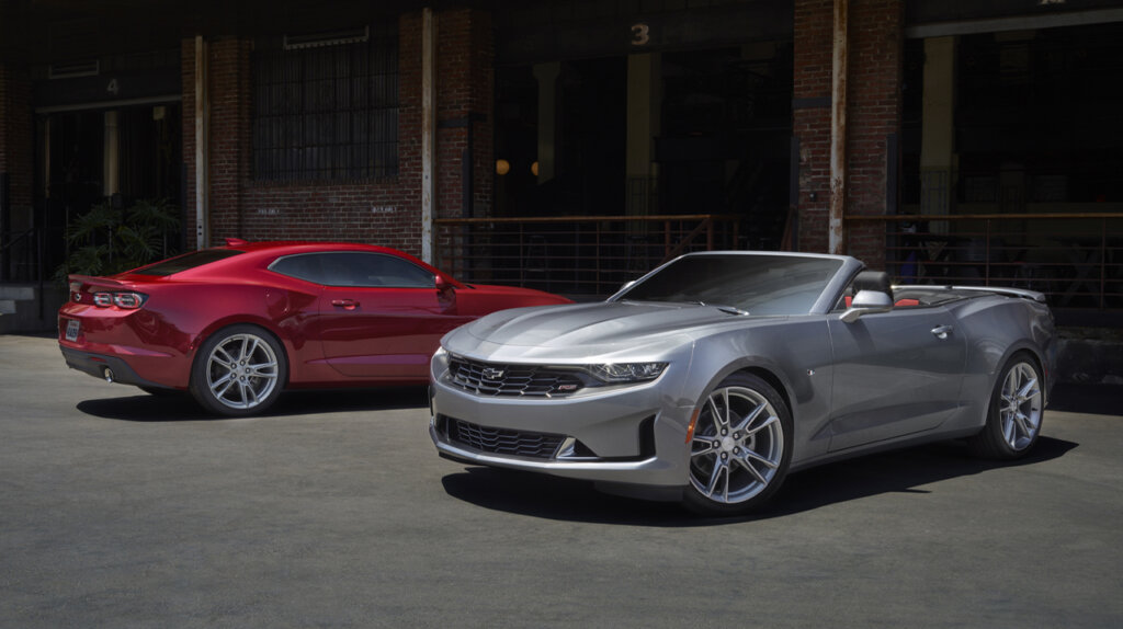 red 2023 chevy camaro coupe and gray 2023 chevy camaro convertible