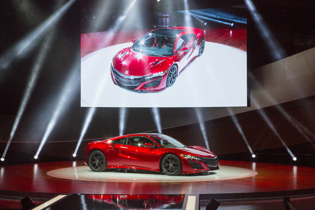 red 2017 acura nsx at a car show