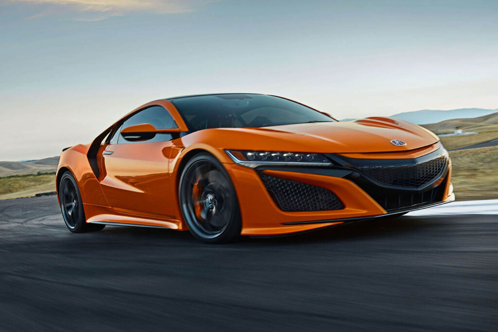orange 2019 acura nsx on a racetrack
