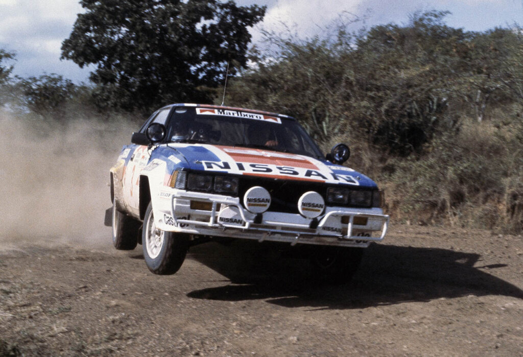 nismo 240 rs driving through dirt