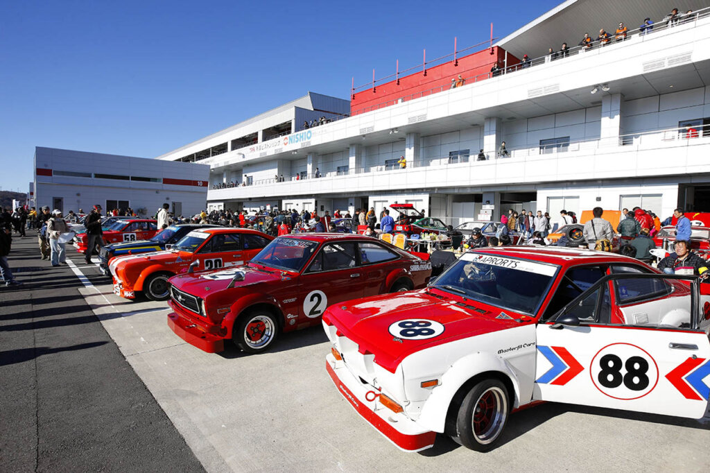 group of nissan race cars at nismo festival