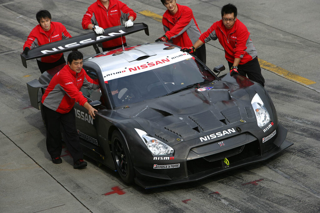 black nissan nismo GT-R 500 being pushed by nismo team