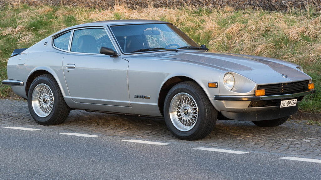 grey nissan 260z on the side of a road