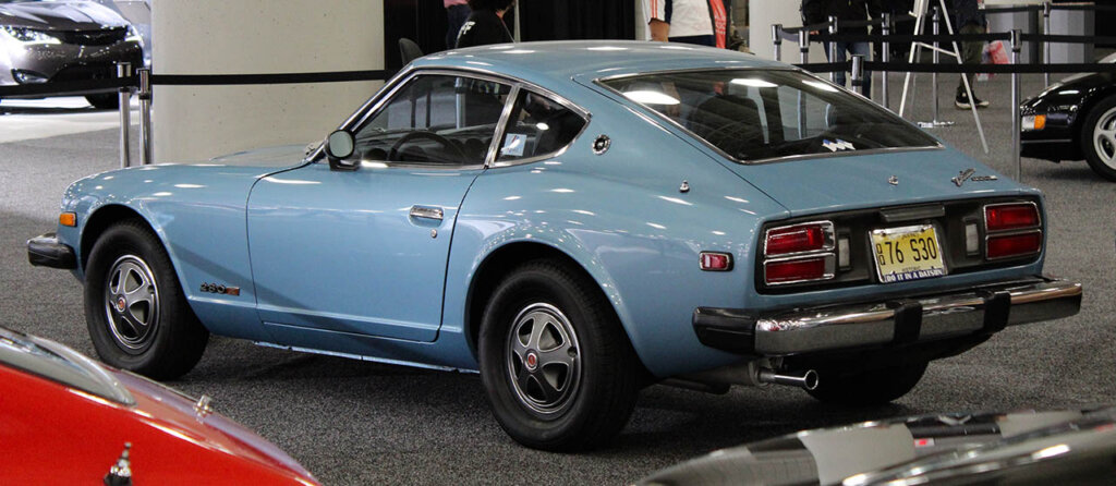 blue nissan 280z in a car display