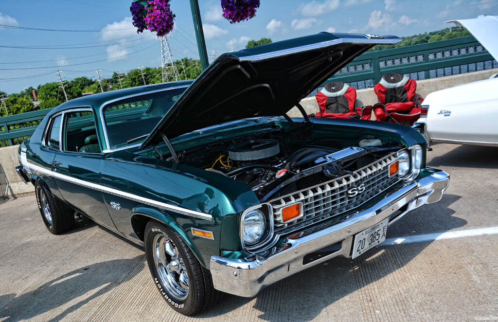 green 1973 Chevy Nova SS Yenko at a car event