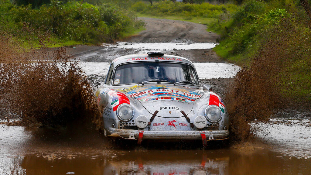 rally racing porsche 356 A driving through mud
