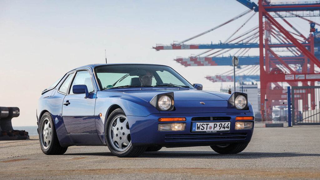 restored blue porsche 944 s2 in a dock