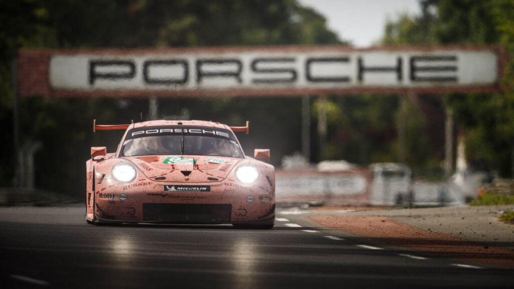 pink porsche 911 rsr at le mans racetrack
