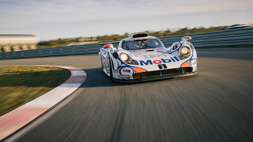 1998 Porsche 911 GT1 racing on a speedway. 