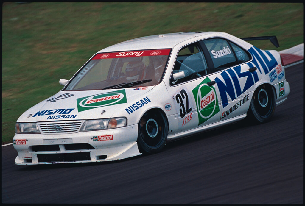 nismo b14 sunny car on a racetrack