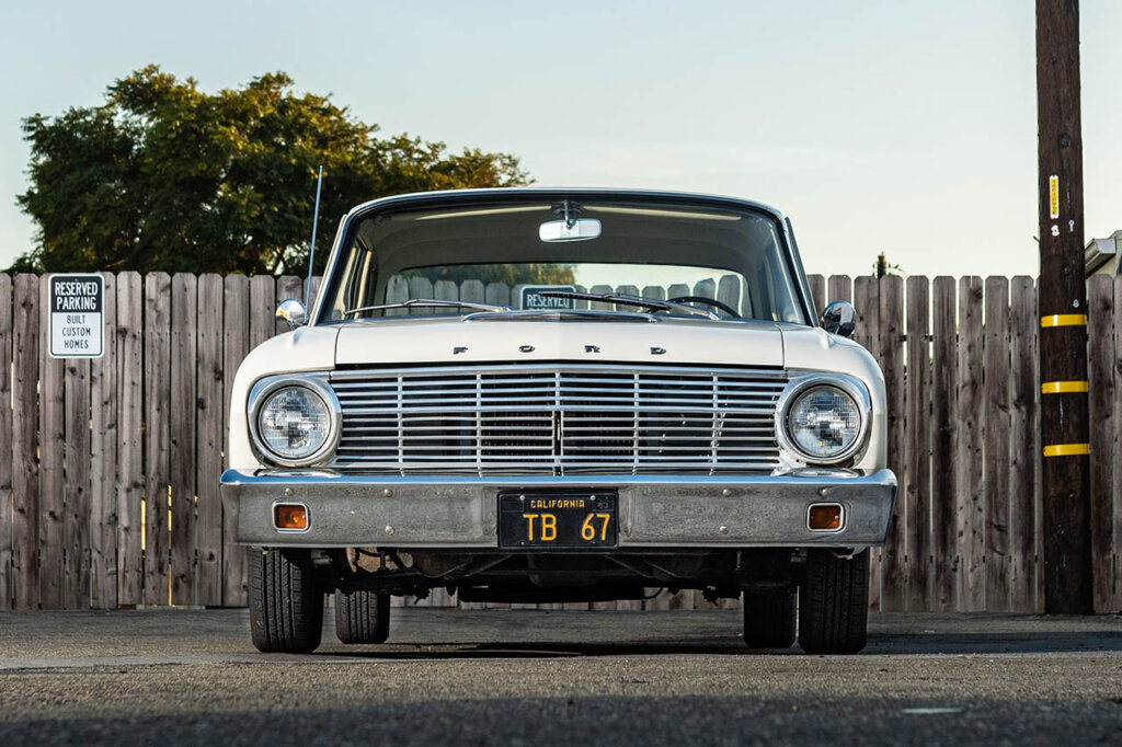 white 63 ford falcon in a  storage area