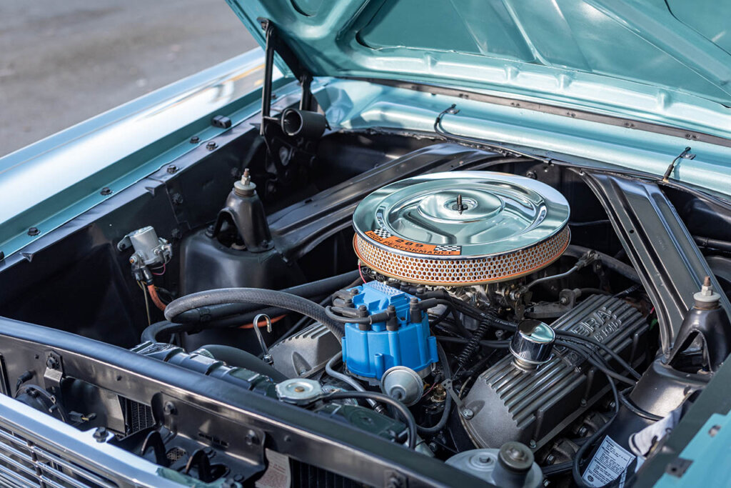 blue 1965 ford falcon engine bay
