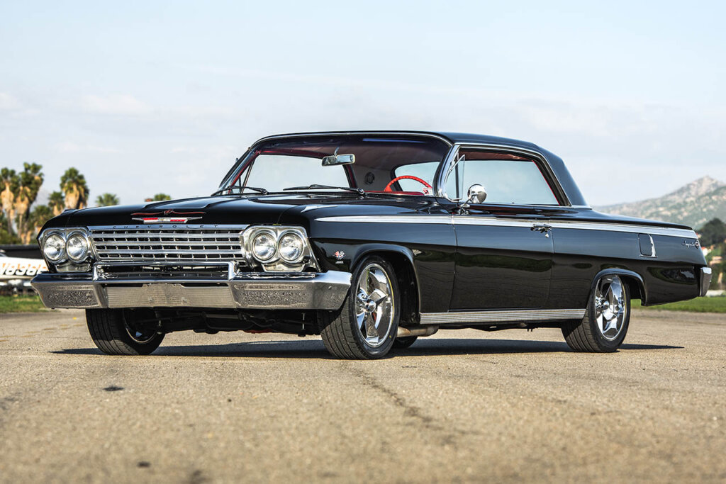 black 62 impala ss on a airport track