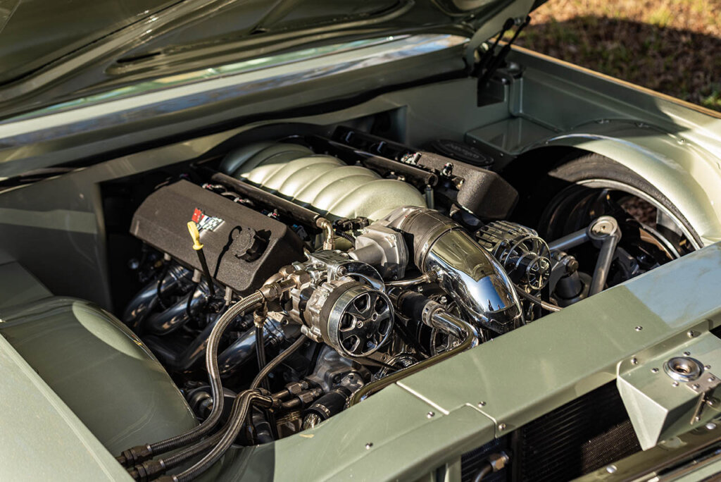 engine bay of a third gen 1961 chevy bubbletop impala