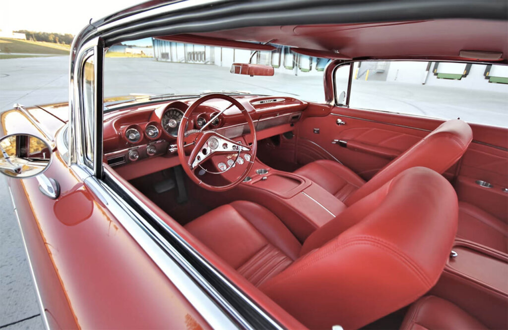 red leather seats inside of a chevy impala