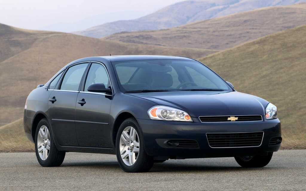 black 2006 Chevrolet Impala LTZ at a desert