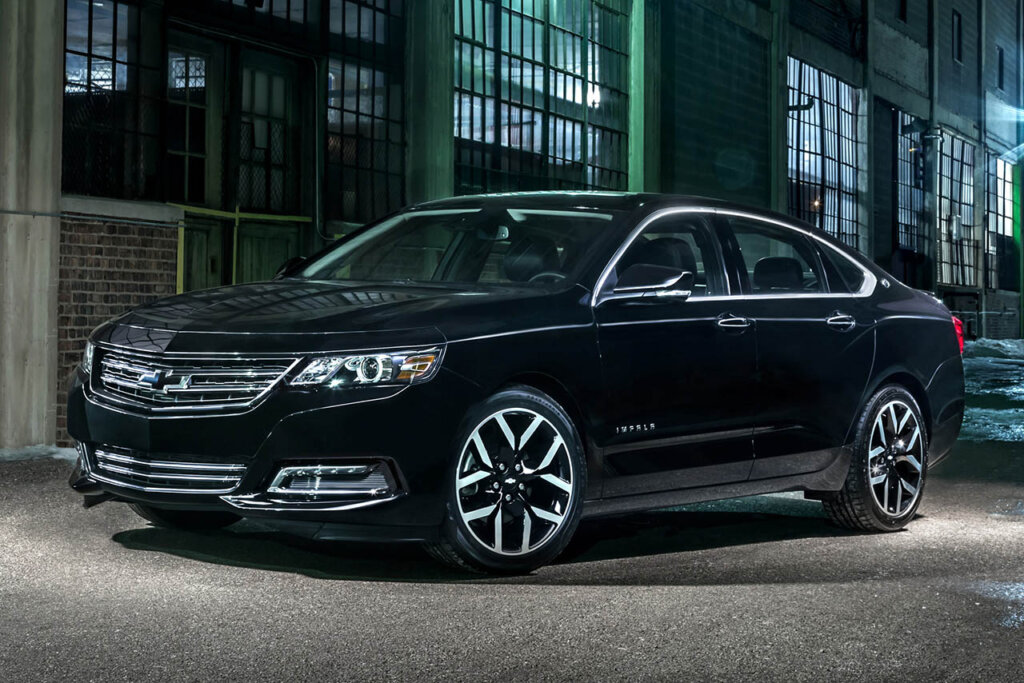 2018 Chevrolet Impala Midnight Edition in front of a warehouse