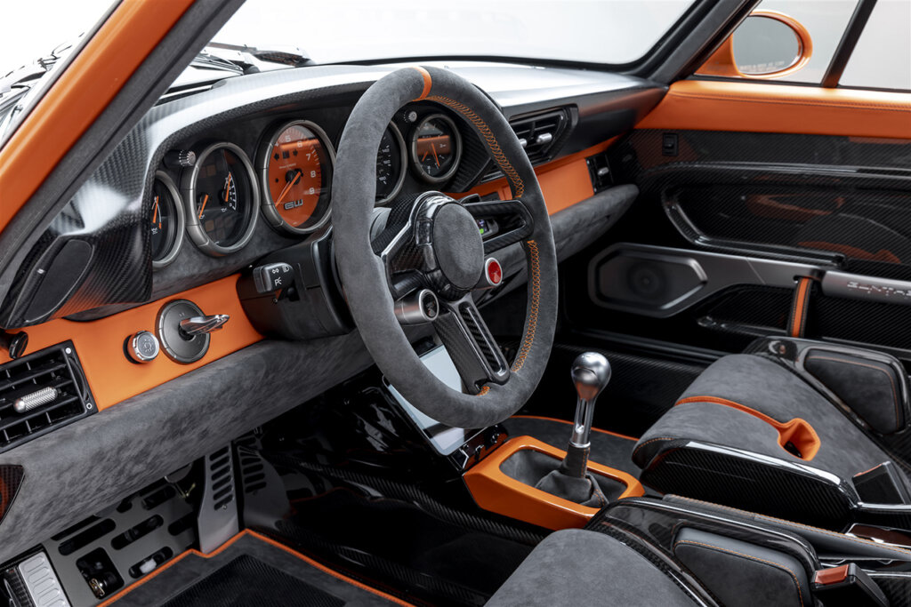 Interior shot of orange porsche 911 restomod