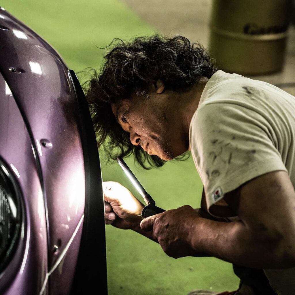 akira nakai working on purple porsche restomod