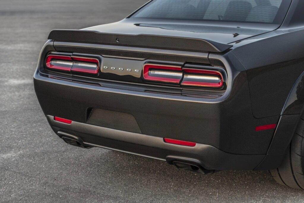 Black Carbon fiber dodge rear taillights with a deck spoiler