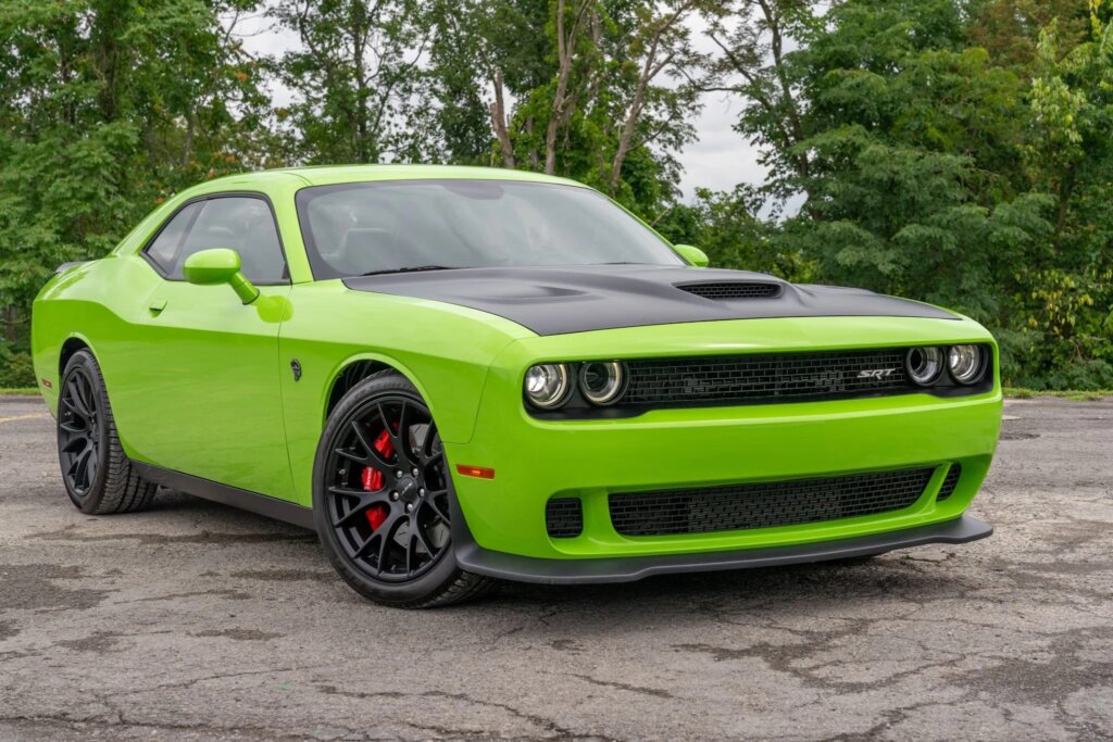 neon green Dodge Challenger on the road