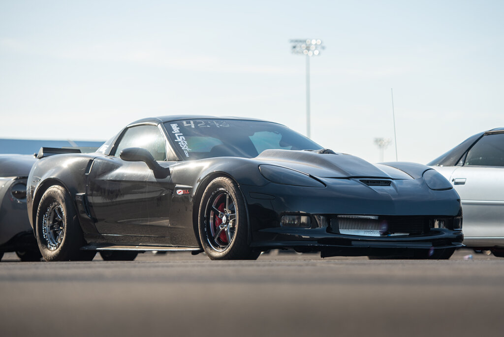 black c6 parked on the ground