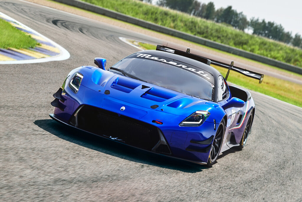 Blue GT2 taking a turn on racetrack