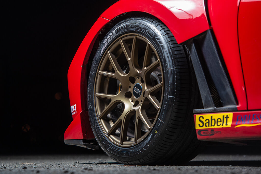 Flow Form Bronze VMR wheels on a red Nissan 370z