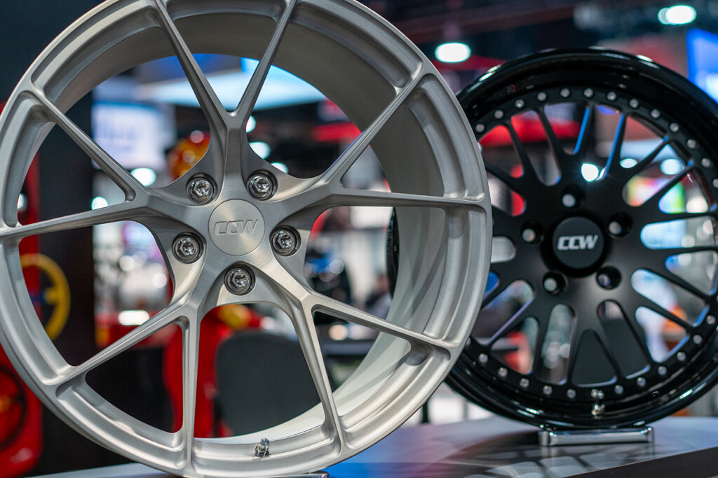 CCW Wheels one silver one black right next to one another
