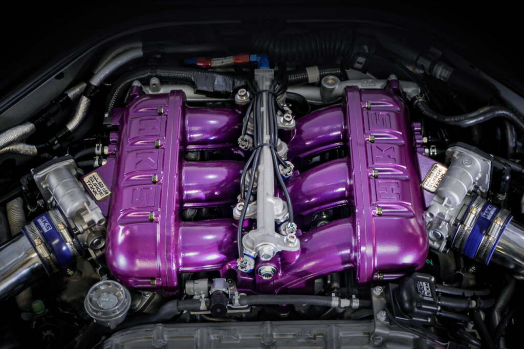 Purple HKS VR38DETT valve cover closeup