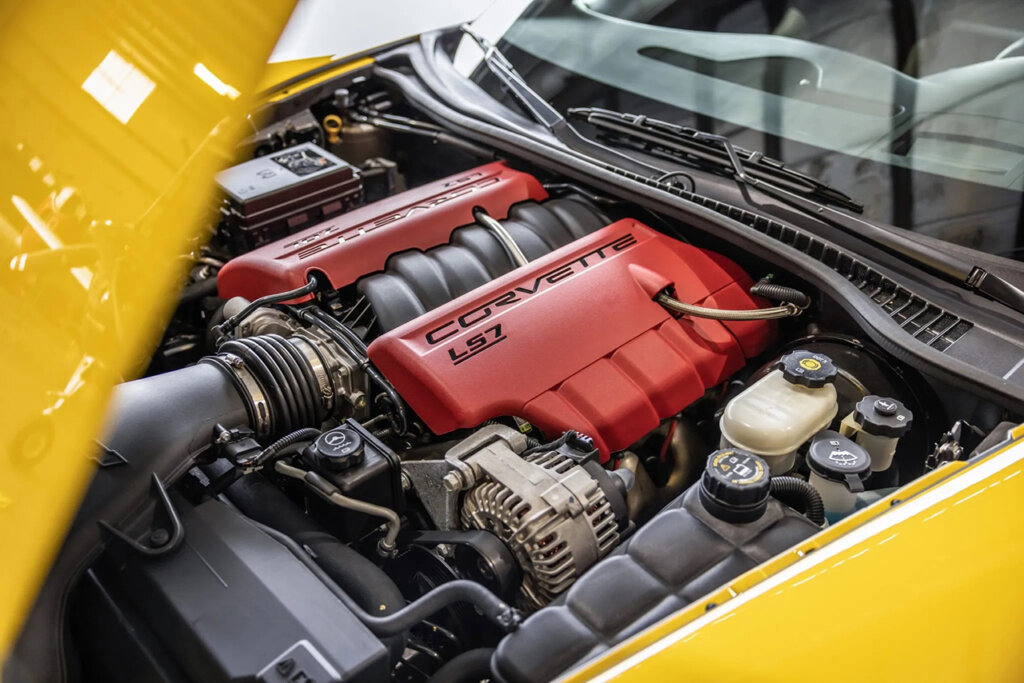LS7 with red engine cover in a yellow c6 corvette