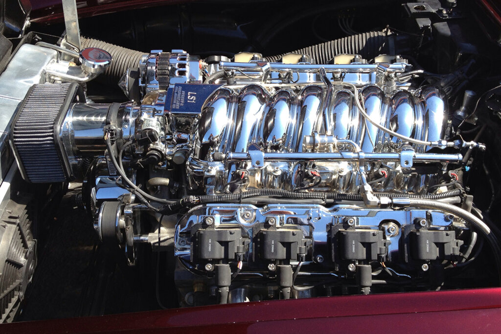 Chrome LS1 engine block in a purple car