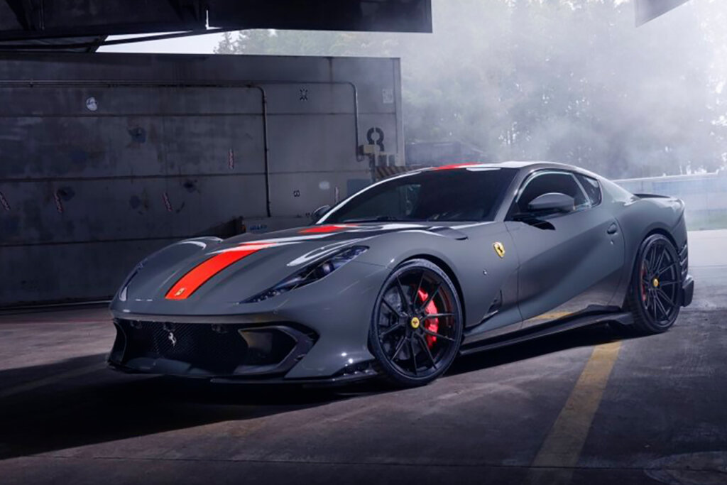 Blue grey Ferrari 812 Competizione with red stripe in a garage