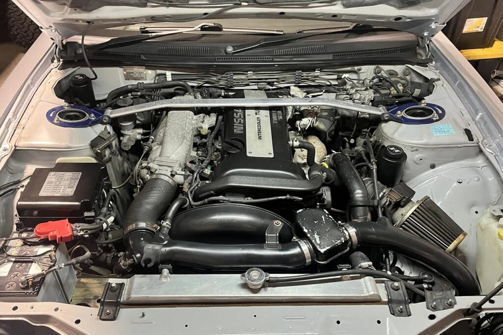 Nissan SR20DE engine in a white car