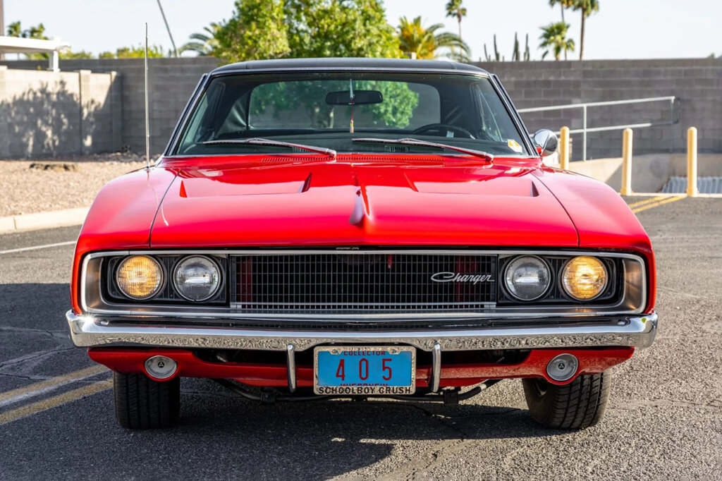 Red B-Body Charger on asphalt