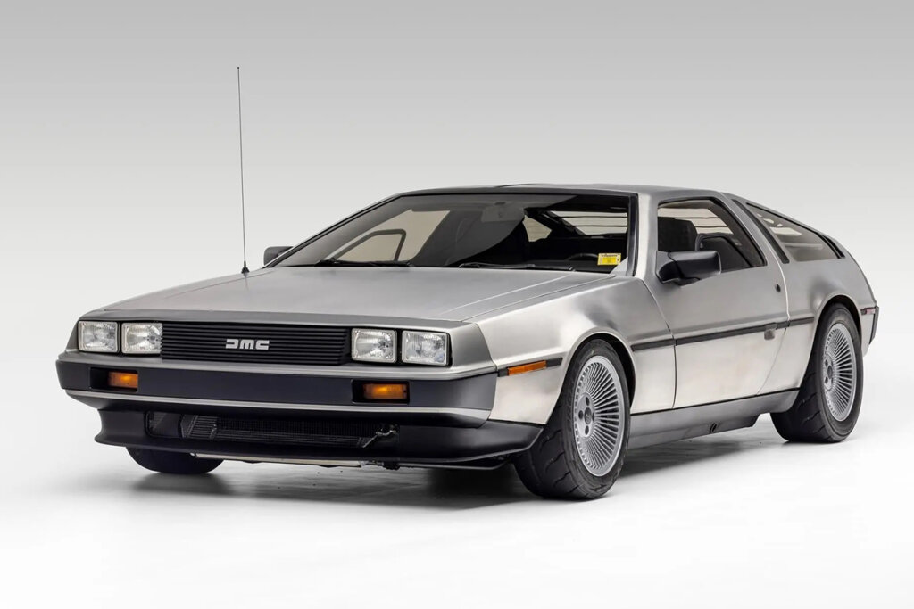 silver DMC12 parked diagonally on a white background
