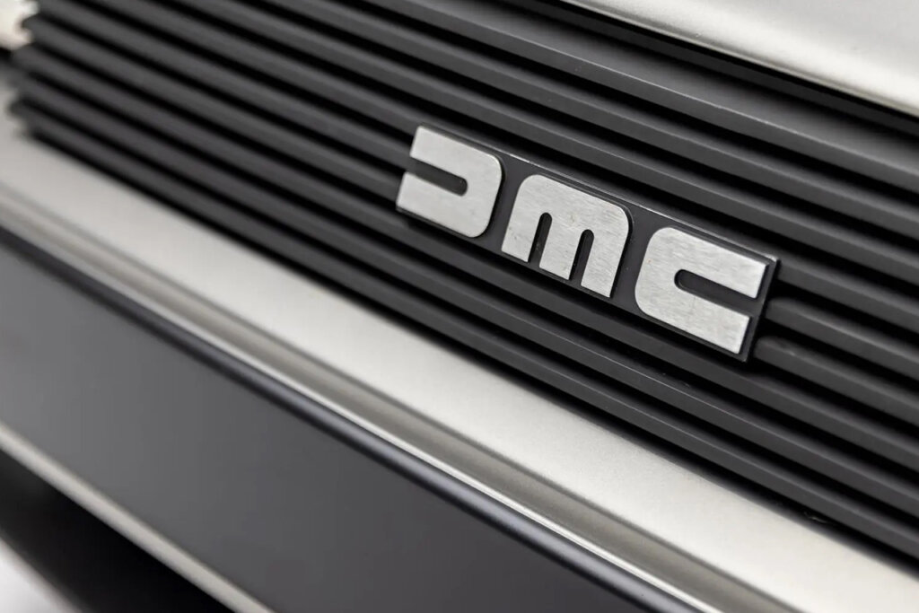DMC badge on a black grill