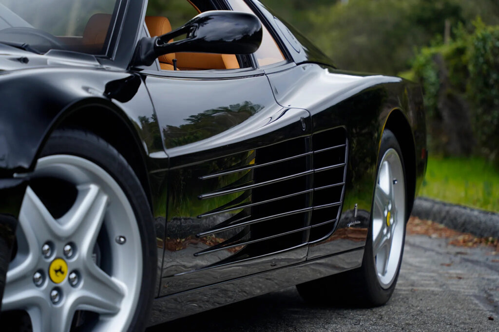 Black 512TR with 6 cut out vents going from the door to the fender